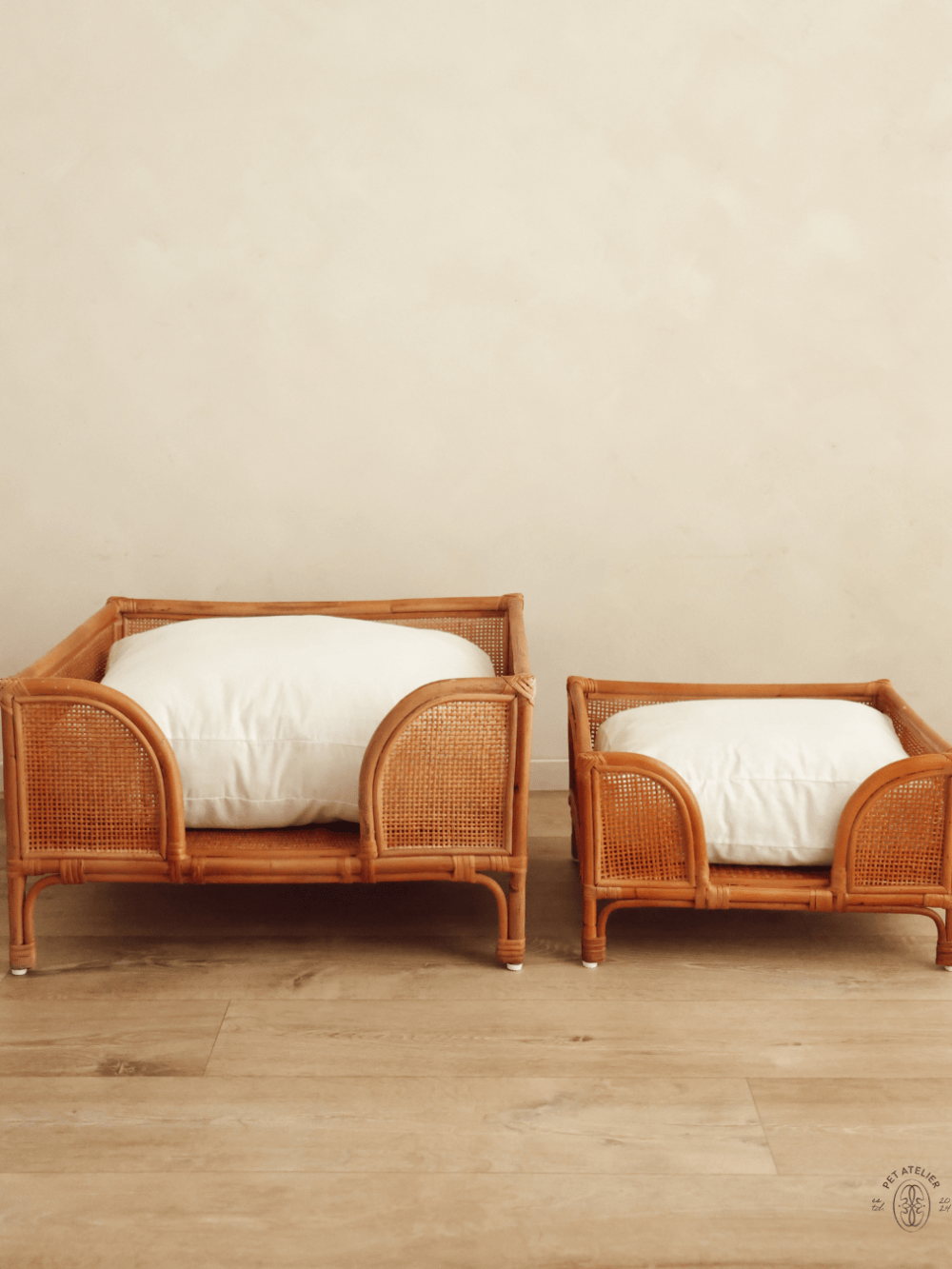 Oliva rattan dog bed in small and large sizes with cushion