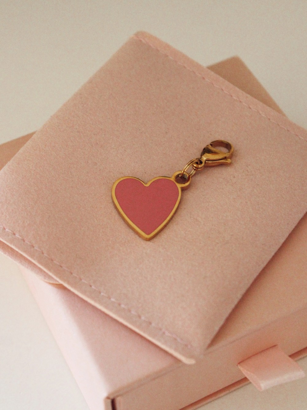 Pink heart enamel charm for dog collars made from stainless steel.