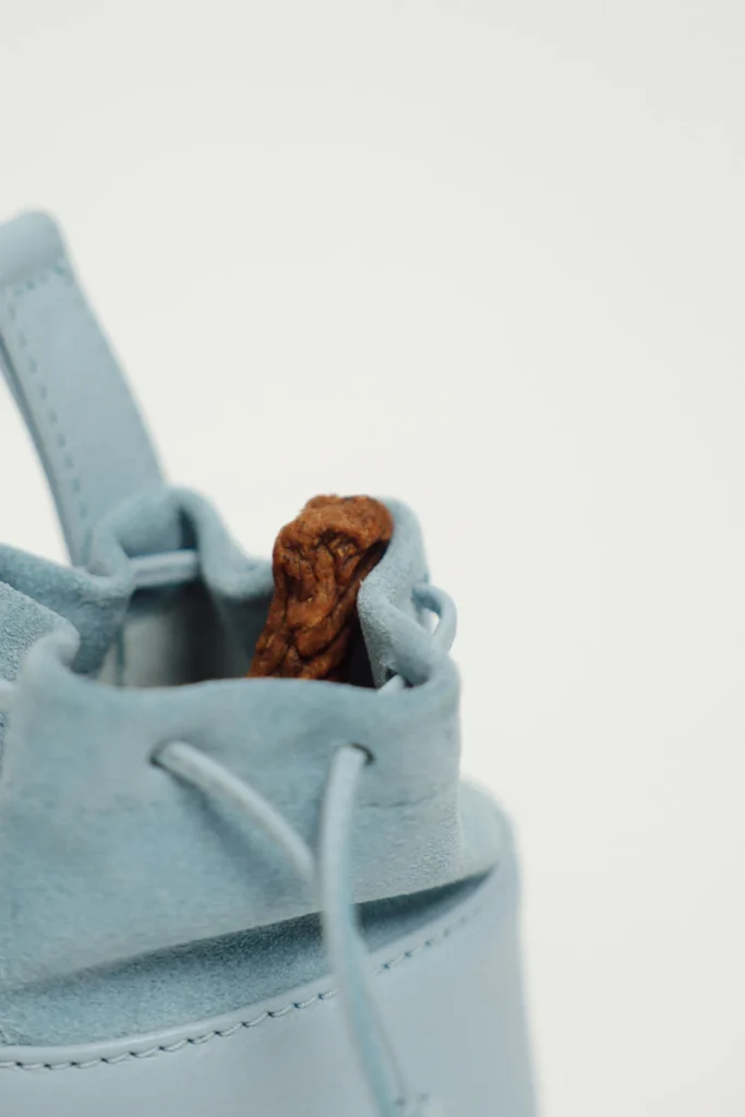 Suede drawstring opening of the Sky Blue leather treat bag