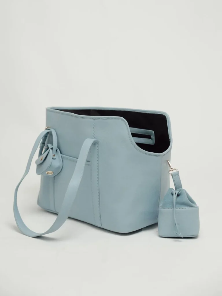 Sky Blue leather dog carrier with the matching poop bag holder and treat bag