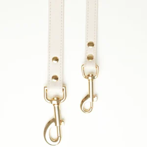 White vegan-leather dog leashes in sizes S and M with gold-tone clasps