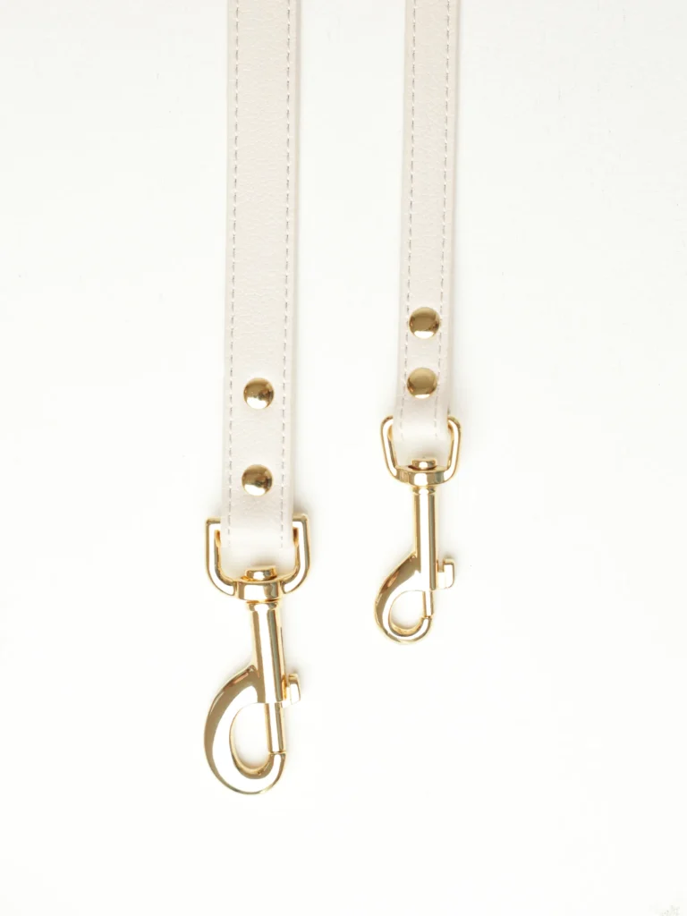 White vegan-leather dog leashes in sizes S and M with gold-tone clasps