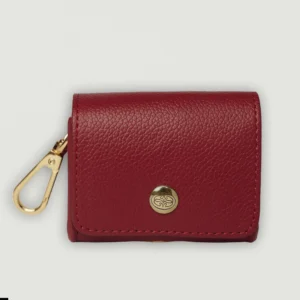 Burgundy poop bag holder with a gold-tone clasp and the Oliva press stud