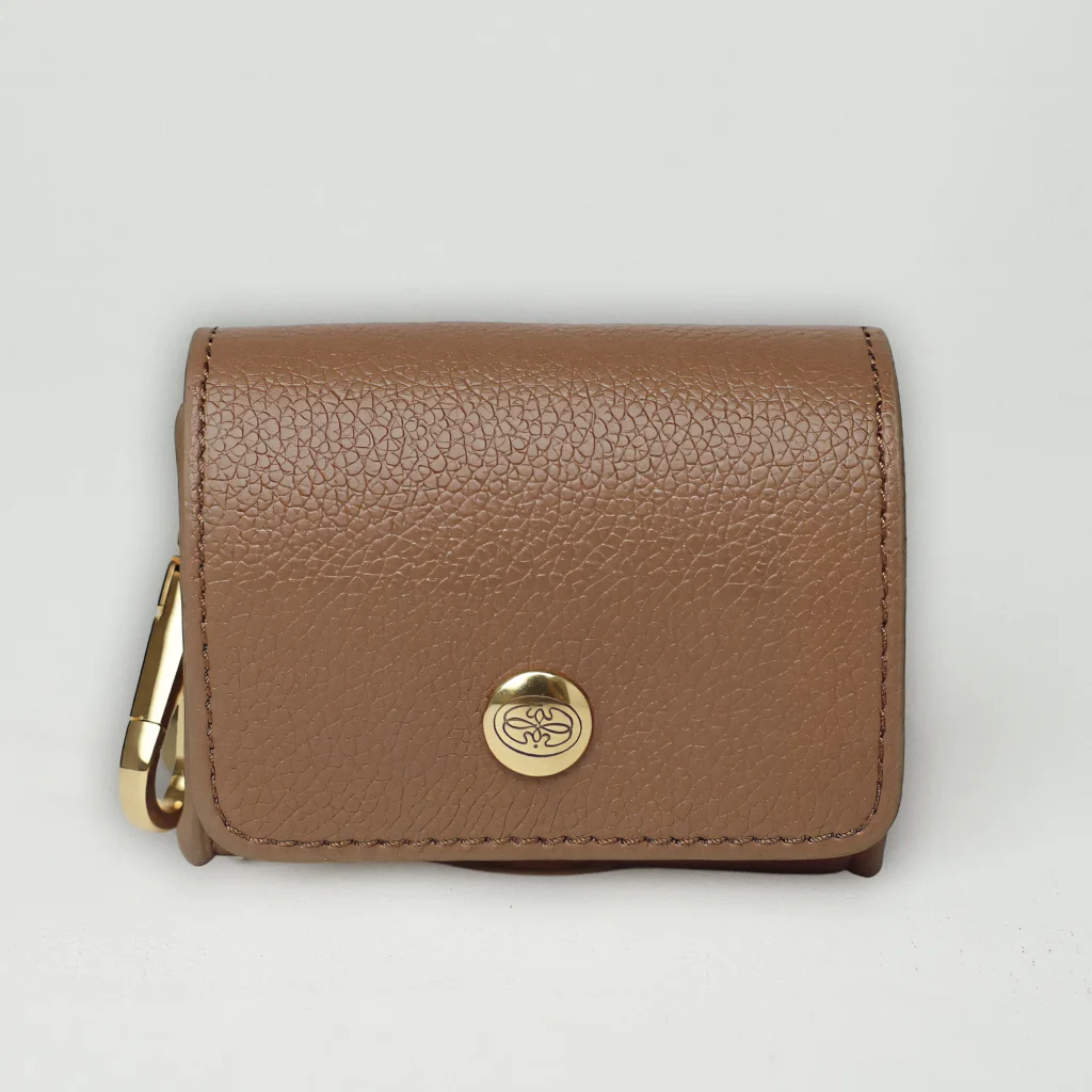Brown poop bag holder with a gold-tone clasp and the Oliva press stud