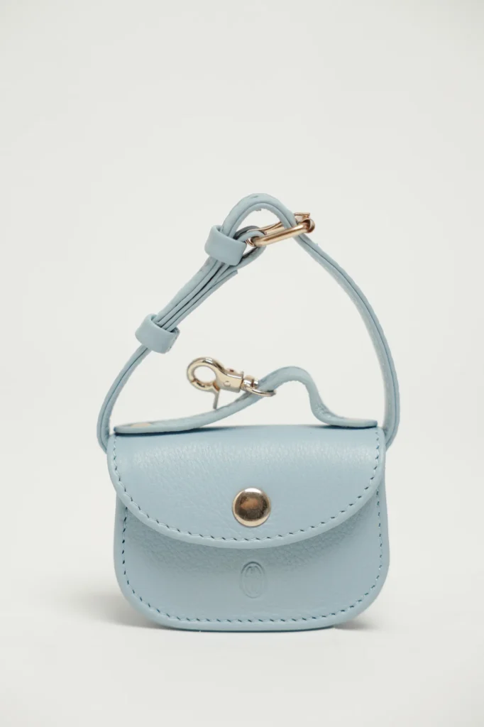 Sky Blue leather poop bag holder with press-stud flap, embossed logo and clip strap